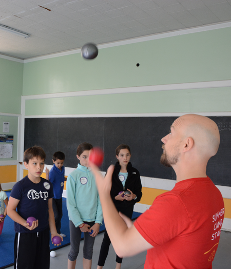 Youth Circus instructor shows students how to juggle | Circus Center | San Francisco